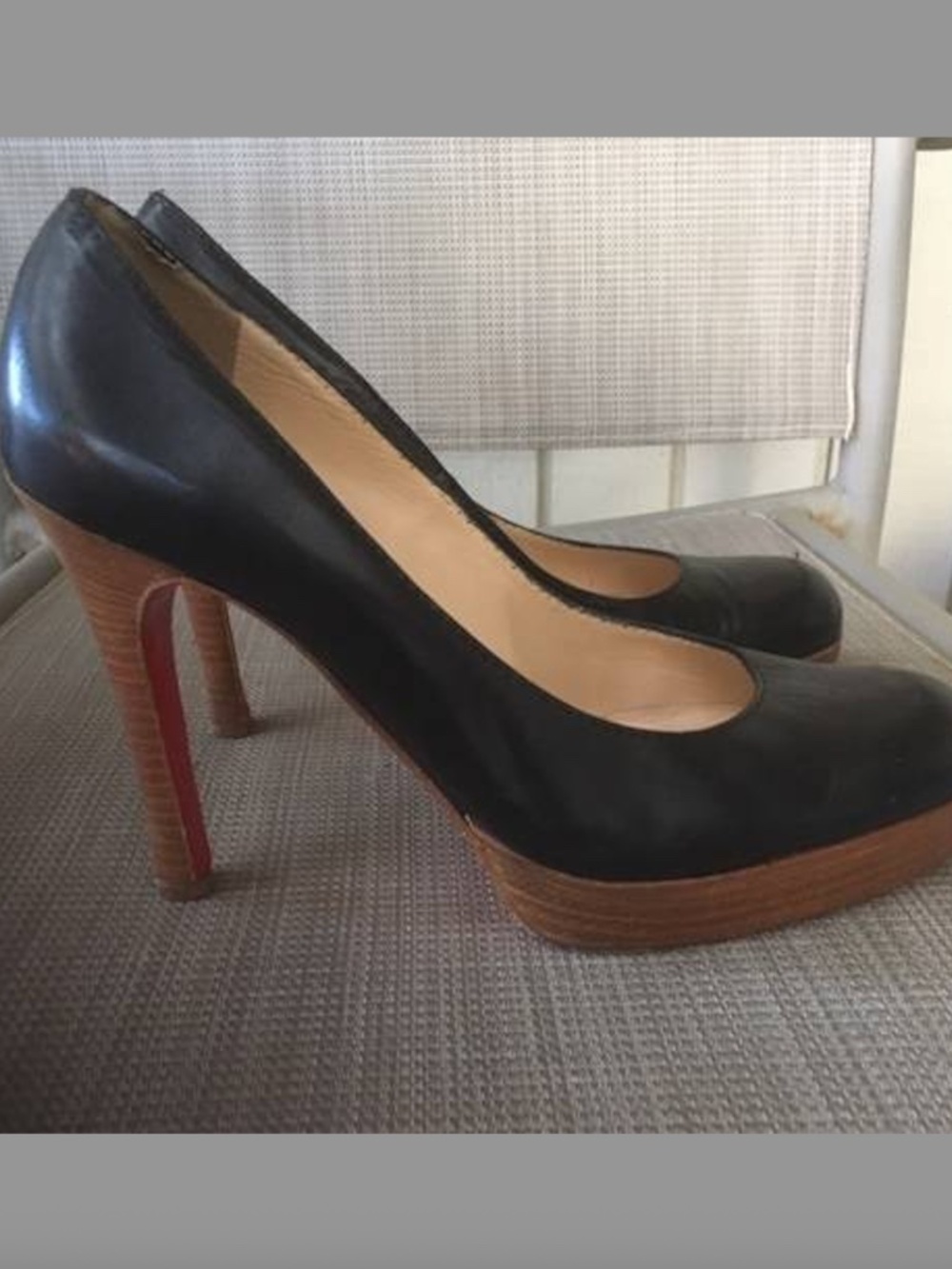 CHRISTIAN LOUBOUTIN  BLACK LEATHER PLATFORM PUMPS